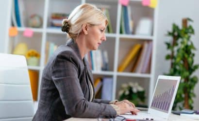 Businesswoman working on laptop