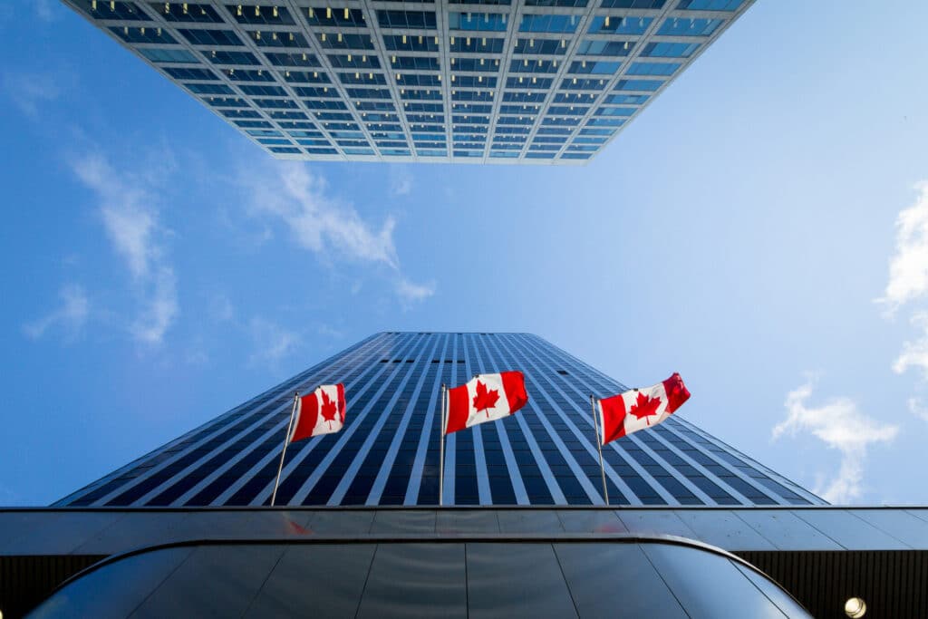 Canadian flags in front of a business building