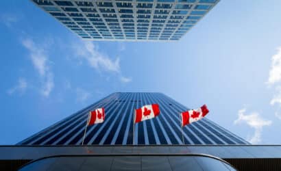 Canadian flags in front of a business building