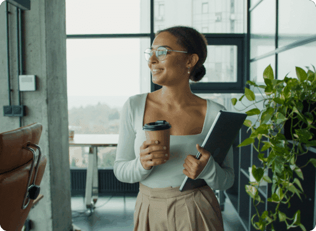 accountant office walking happy coffee laptop