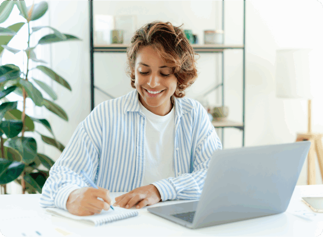 woman writing notes office